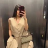 Gilet bacchettato beige