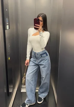 Jeans a vita bassa con tasca cuori