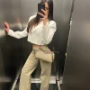 Jeans con brillanti beige