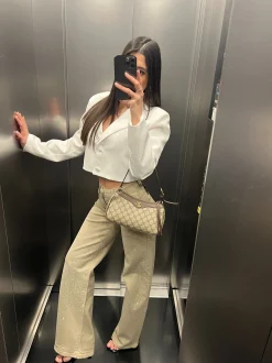 Jeans con brillanti beige
