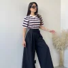 Pantalone oversize con cintura con fiore